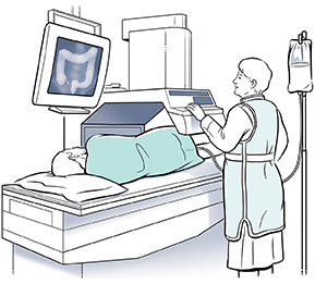 Health care provider giving barium enema to patient on exam table and taking X-ray image. 